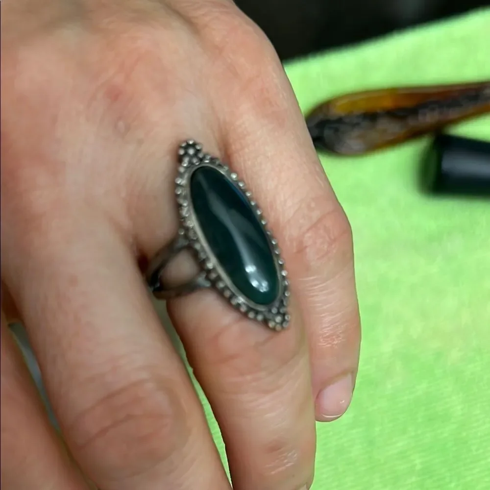 Elegant Silver and Green Oval Ring
